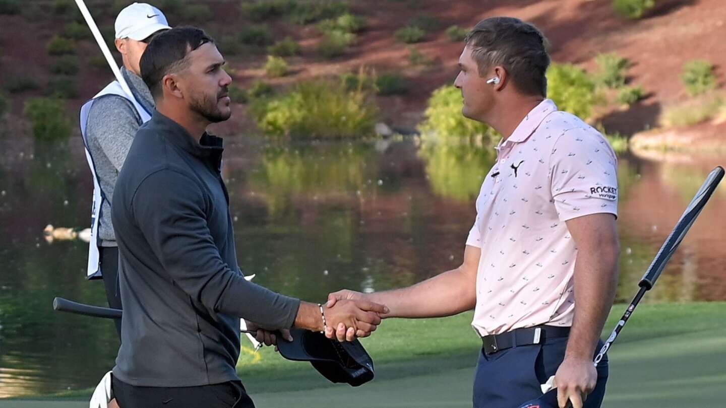 koepka_1920_dechambeau_thematch21_handshake.jpg