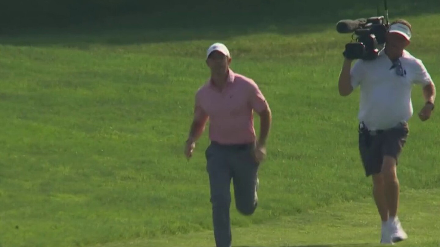 Rory McIlroy tests cameraman’s stamina with a sprint on the 17th hole at Memorial Rory McIlroy tests cameraman’s stamina with a sprint on the 17th hole at Memorial