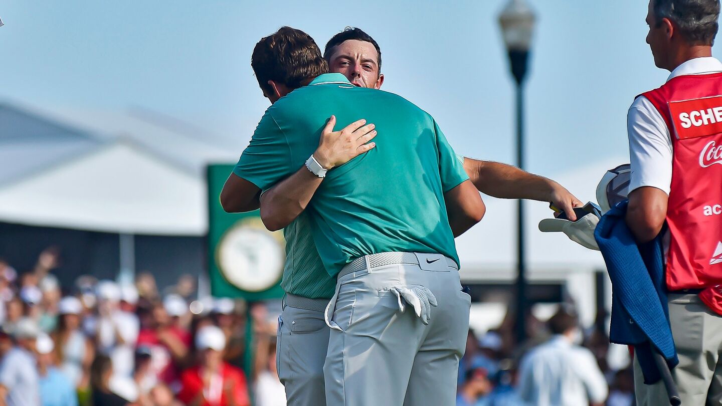 mcilroy_1920_tc22_d4_hug_scheffler_0.jpg