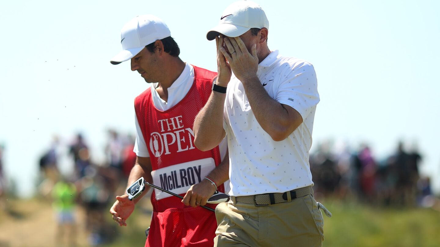 mcilroy_1920_open21_d4_hands_face.jpg