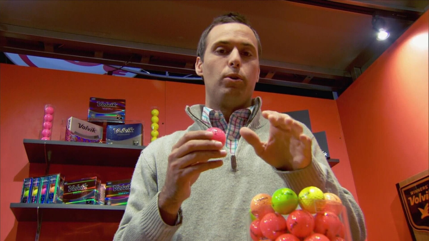 Roll with it: Golf balls and putters on display