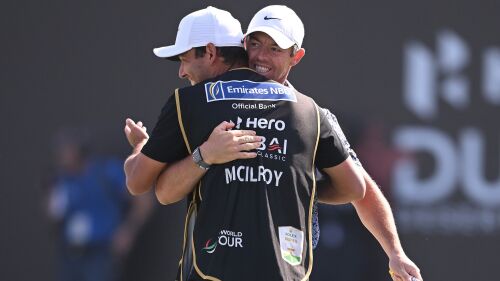 McIlroy_1920_Dubai23_Caddie_Hug.jpg