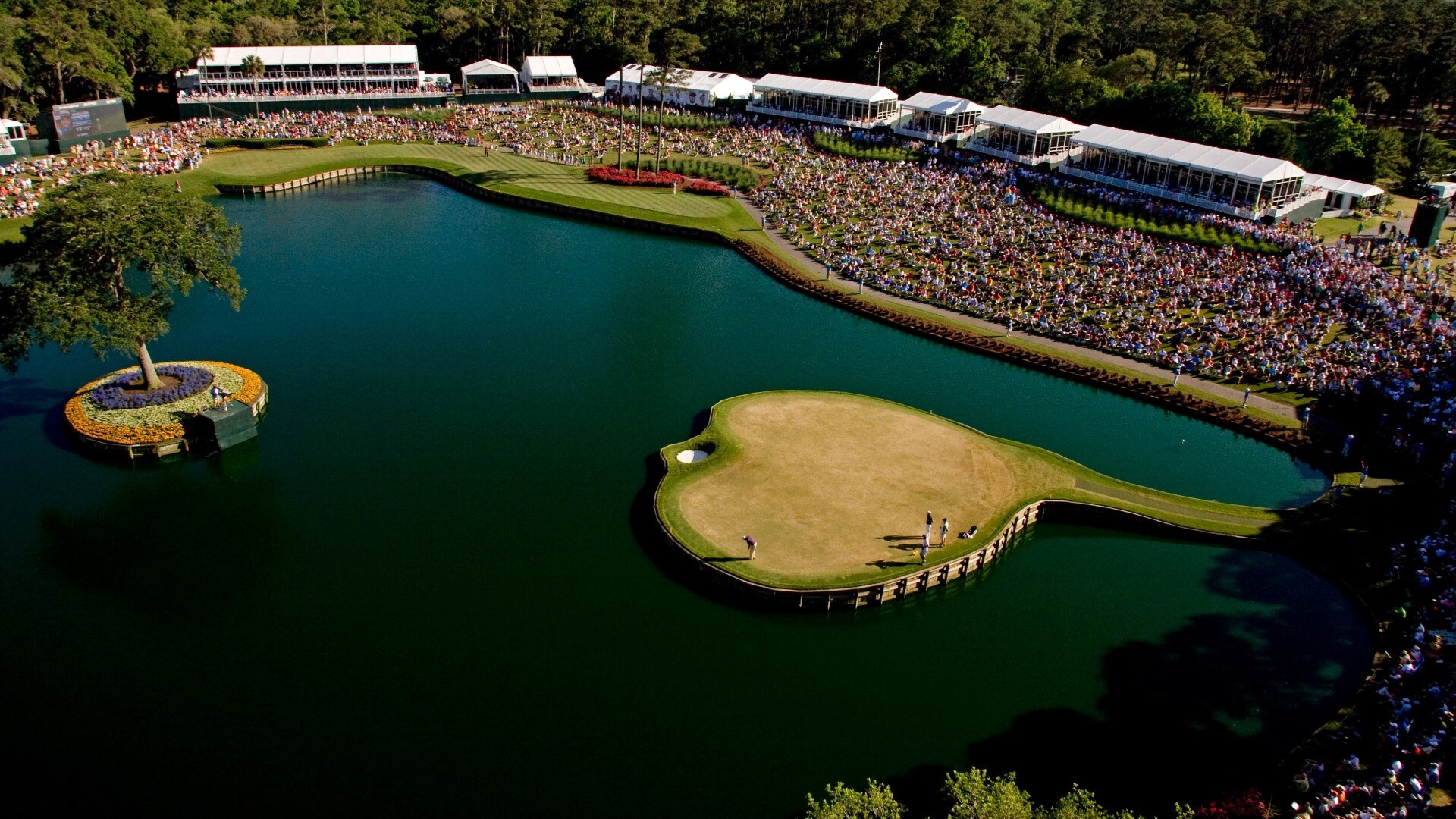 The iconic 17th island green and clubhouse at TPC Sawgrass during tournament preparations