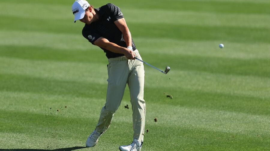 Maverick McNealy hits an iron in the 2022 WGC-Dell Technologies Match Play