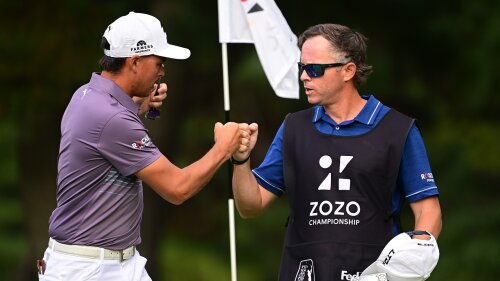 Fowler_1920_Zozo22_CaddieFistBump.jpg