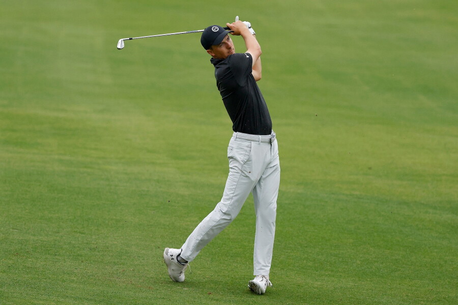 Jordan Spieth hits a shot in the fairway